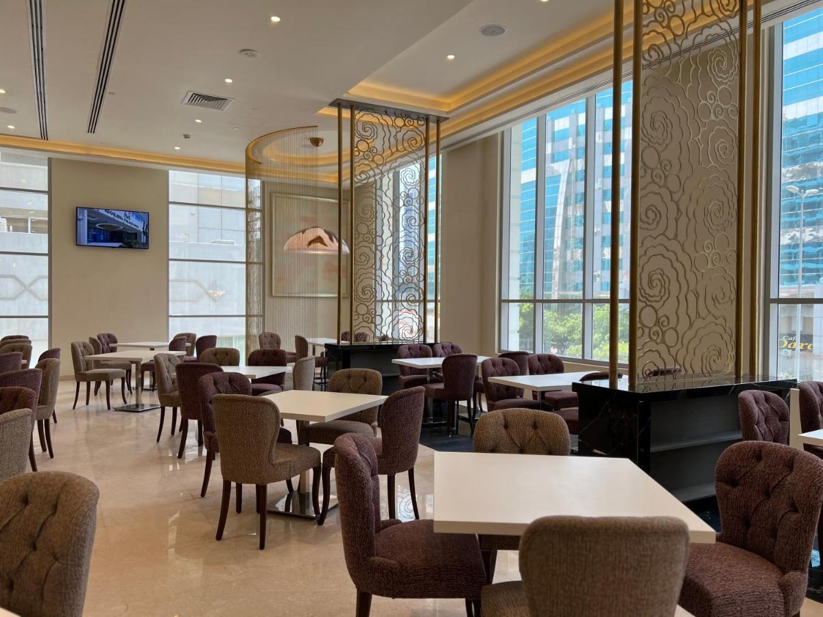 Khalidia Palace Hotel Dubai By Mourouj Gloria Dış mekan fotoğraf The lounge at the airport