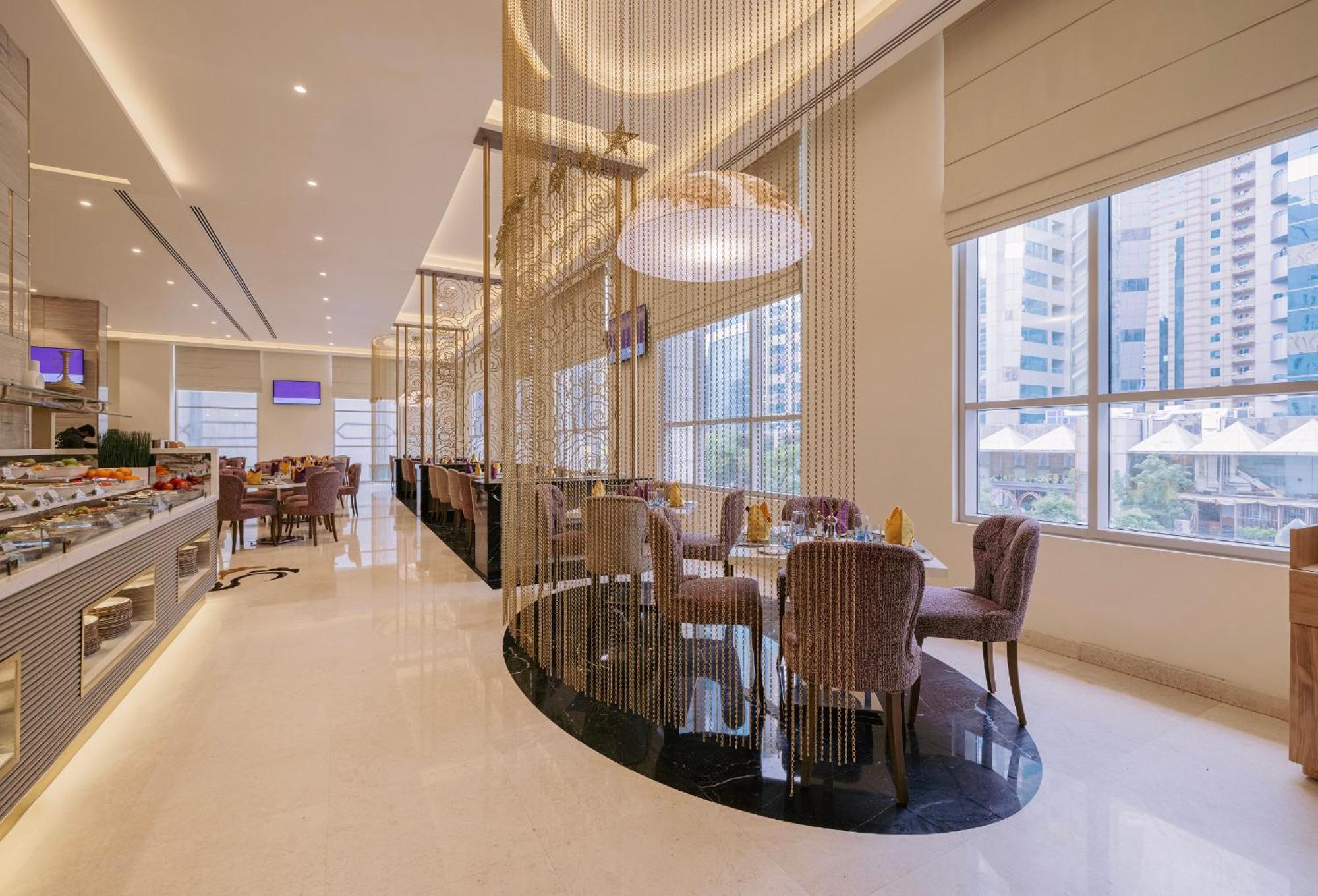 Khalidia Palace Hotel Dubai By Mourouj Gloria Dış mekan fotoğraf The restaurant